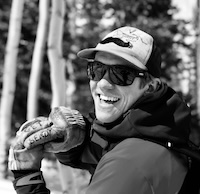 headshot of Chris Dickson in front of Aspen trees