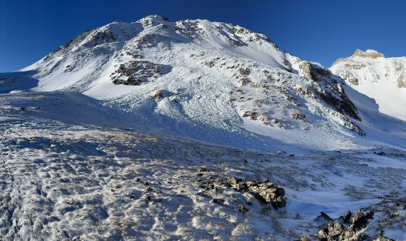 A large avalanche on the southeast face of Hagar Mountain that produced the three separate debris piles in this picture.