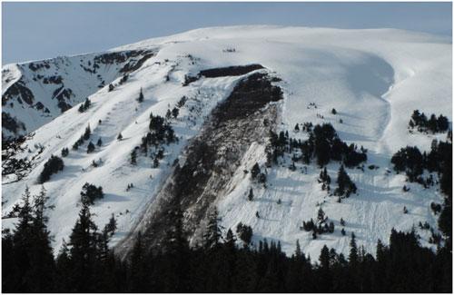 This Glide Avalanche broke to the ground on a smooth, grassy slope. From all the mud on the bed surface, water pooling at the base of the snowpack likely caused the failure.